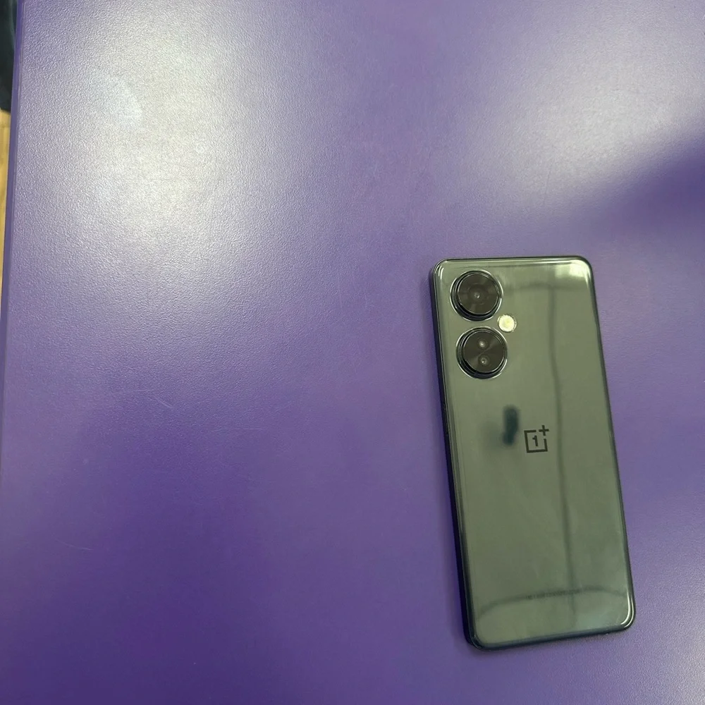 OnePlus Smartphone in Black with Blue Accent Display